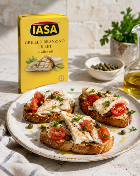 IASA grilled branzino in olive oil served on crostini with tomatoes and capers
