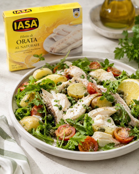 IASA Mediterranean sea bream served on crostini with capers and parsley