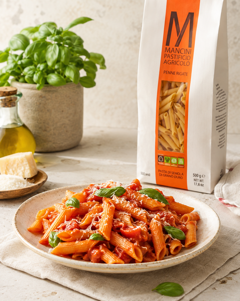 Pasta Mancini Penne Rigate with tomato sauce, basil and Parmigiano