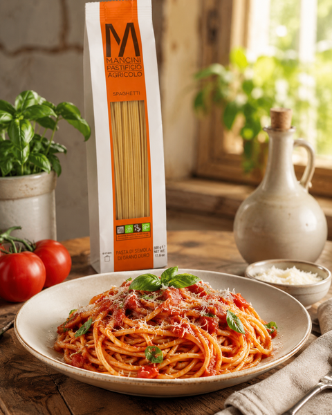 Pasta Mancini Spaghetti with tomato sauce, basil and Parmigiano Reggiano