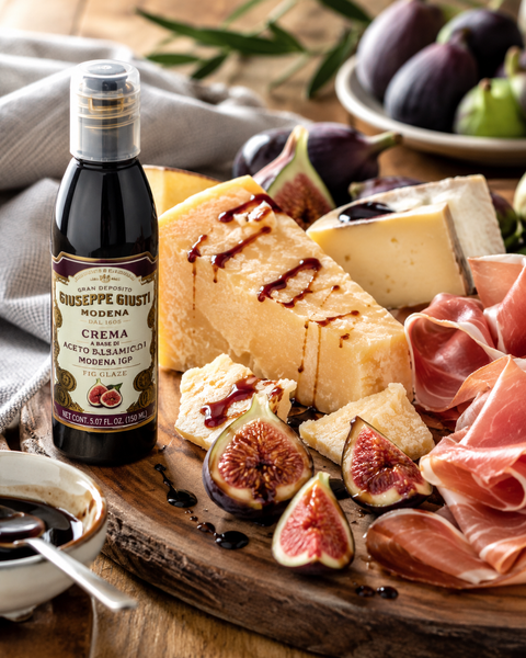 Giusti fig balsamic glaze served with Parmigiano Reggiano fresh figs and prosciutto
